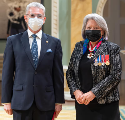 His Excellency Carlos Alberto Patricio Játiva Naranjo, Ambassador of the Republic of Ecuador, stands next to Her Excellency.