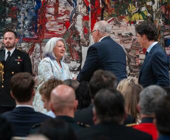 Governor General Marie Simon shakes hands with Minister Bill Blair